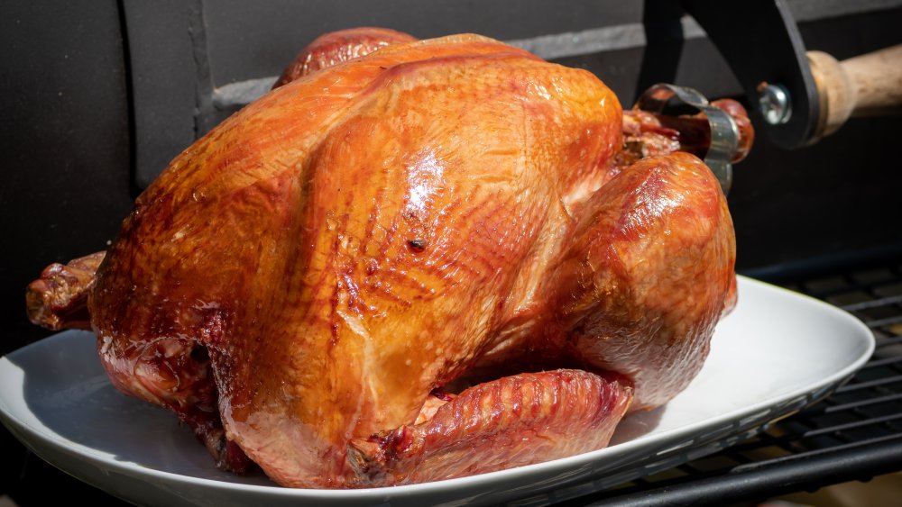 Smoked turkey on white platter