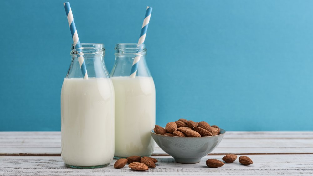 Two bottles with almond milk