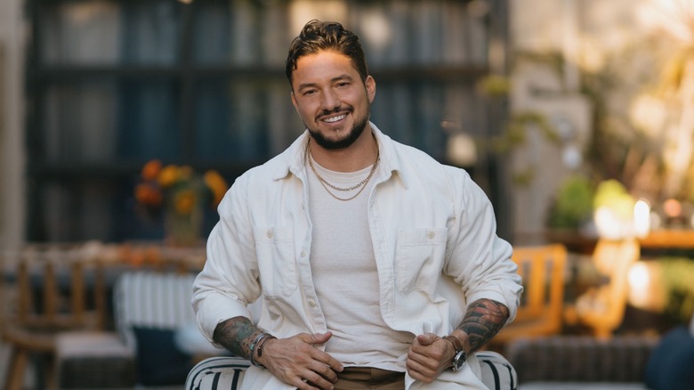 Gabe Bertaccini smiling outside on patio