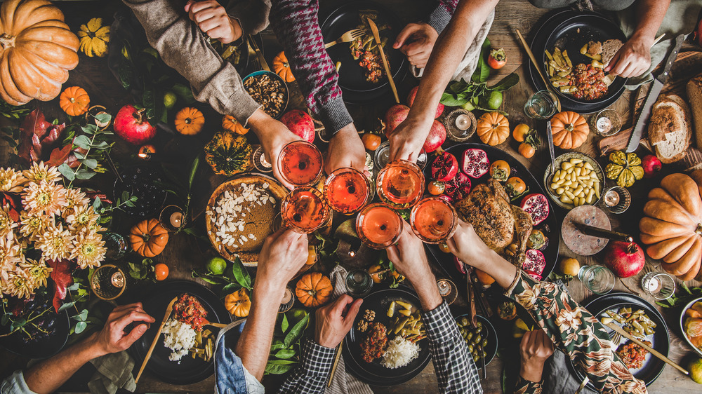 family celebrating Thanksgiving dinner