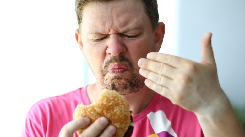 Man staring at stale bun