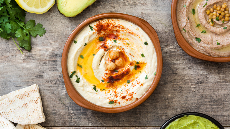 Bowl of hummus on display