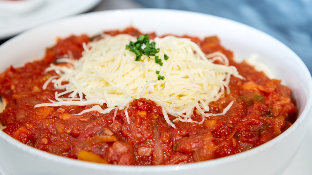 Bowl of Bolognese sauce and cheese