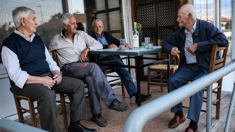 Greek locals drinking ouzo