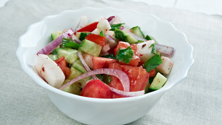 Persian cucumber salad tomatoes white bowl