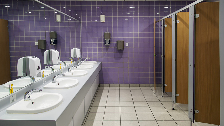 Public restroom with sinks and stalls