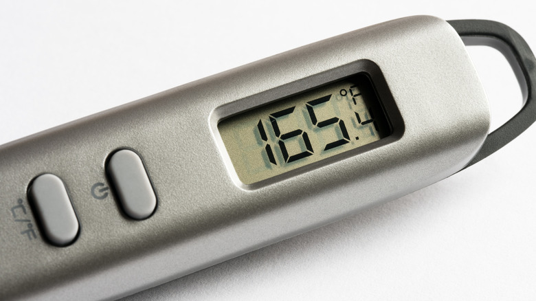 thermometer with 165 degrees on screen