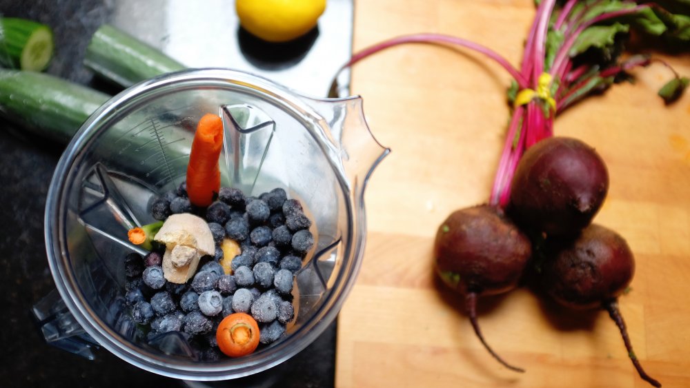 vitamix blender with fruits and vegetables