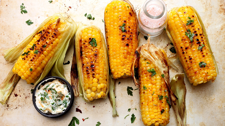 Grilled yellow corn cobs