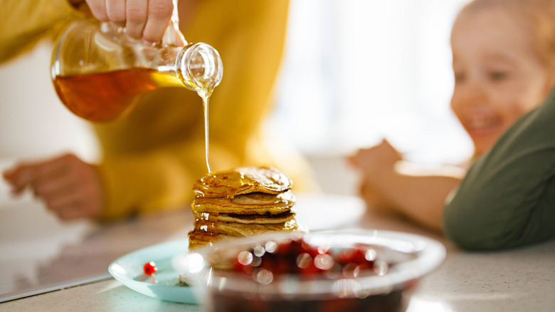 drizzled maple syrup on pancakes