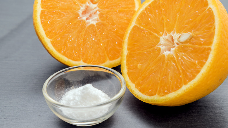 ascorbic acid powder and orange