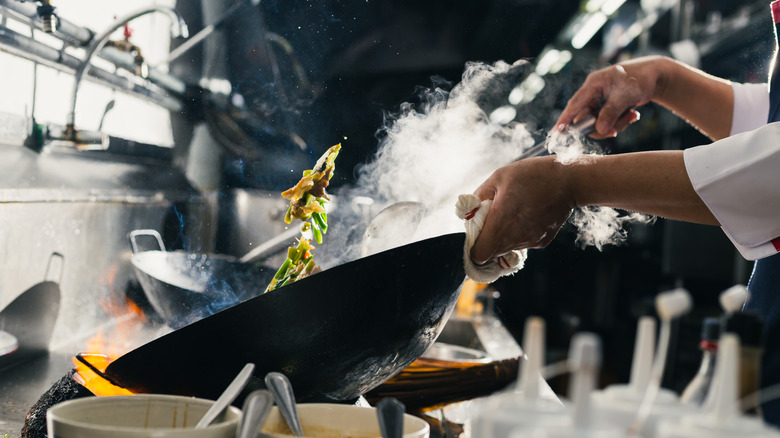 Cooking food in large pan