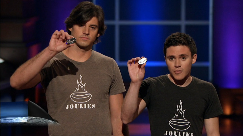 Dave Petrillo and Dave Jackson hold coffee joulies