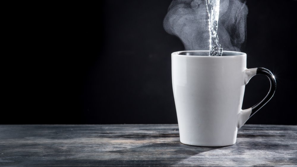 steaming cup of hot water