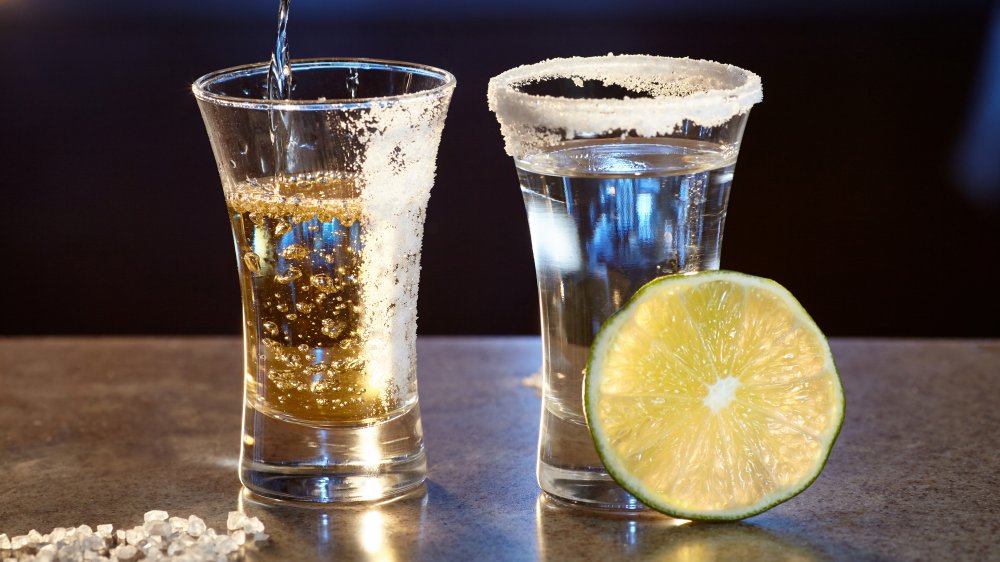 Shots of tequila with salt and lime