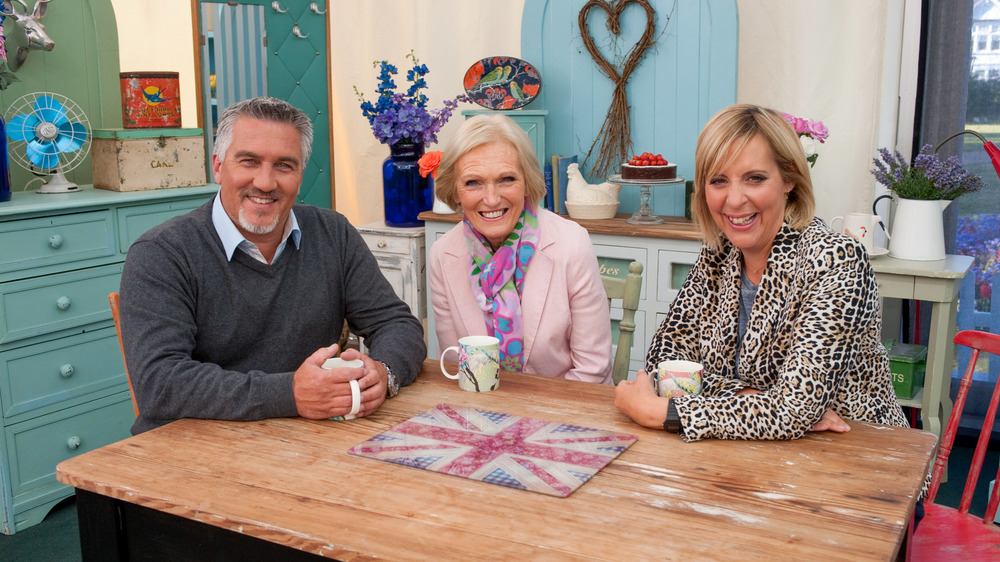 Paul Hollywood, Mary Berry, and Mel Giedroyc smiling