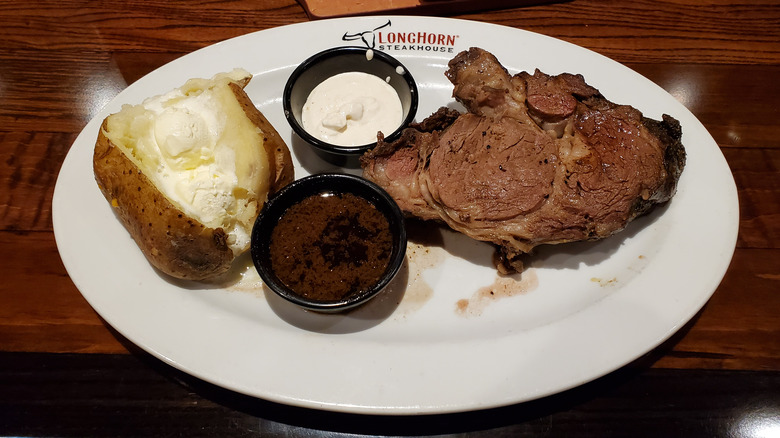 steak and baked potato from Longhorn Steakhouse