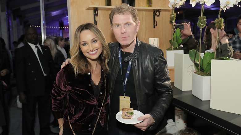 Giada De Laurentiis and Bobby Flay standing