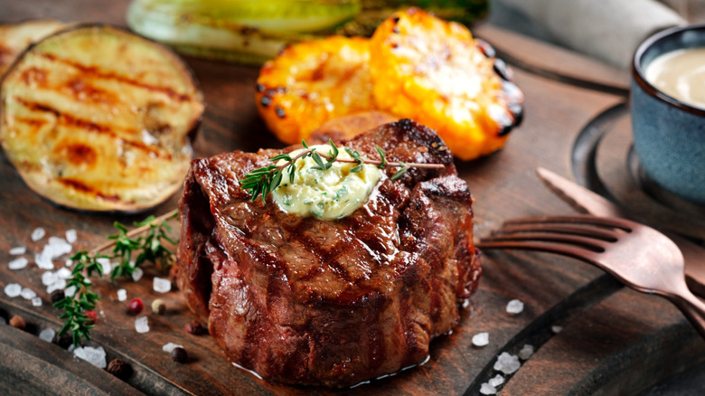 Beef tenderloin with garlic butter and zucchini