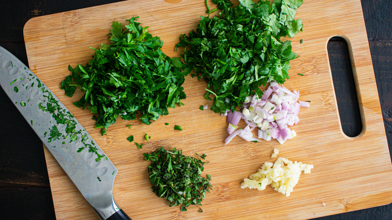 various chopped herbs, shallot, and garlic