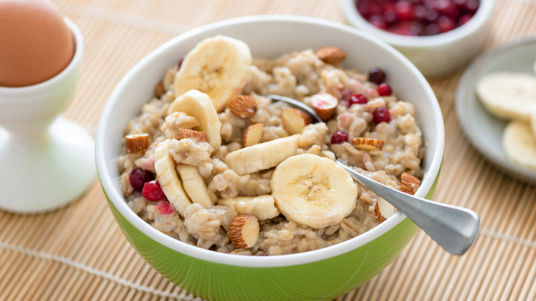 bowl of oatmeal with bananas