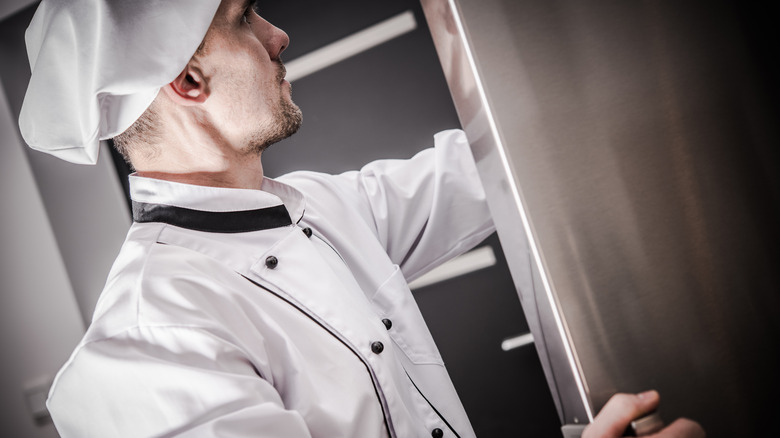 chef checking the fridge