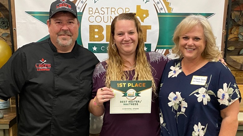 Restaurateurs Leo and Michelle Gaertner with staff member