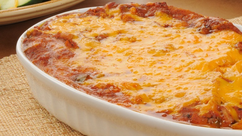 Cheese-topped casserole with tomato sauce 