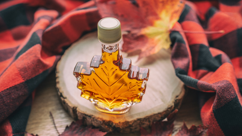 maple syrup in a maple leaf bottle