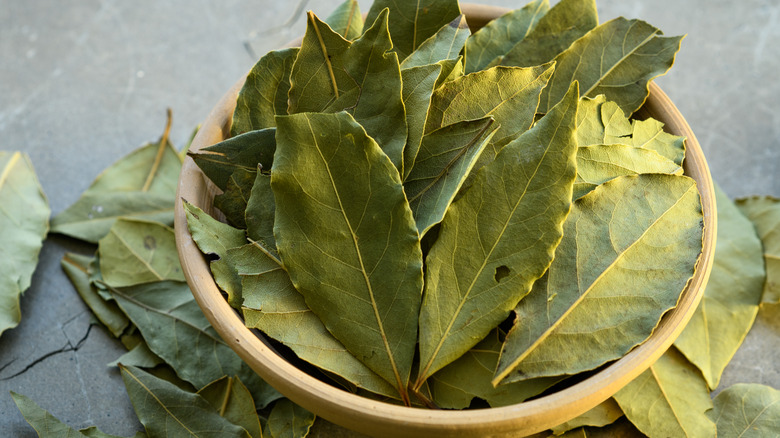 Wood bowl of dried bay leaves