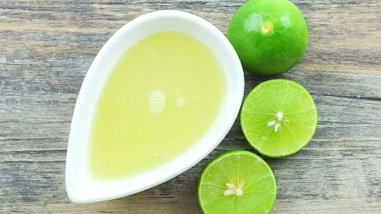Cut lime with bowl of lime juice