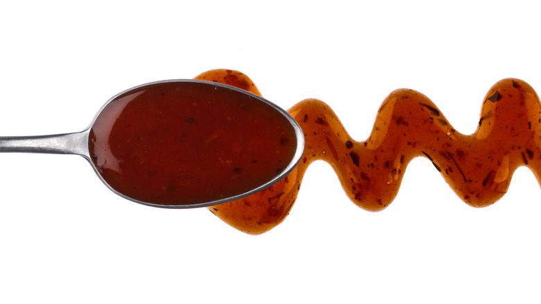 Spoon with teriyaki sauce