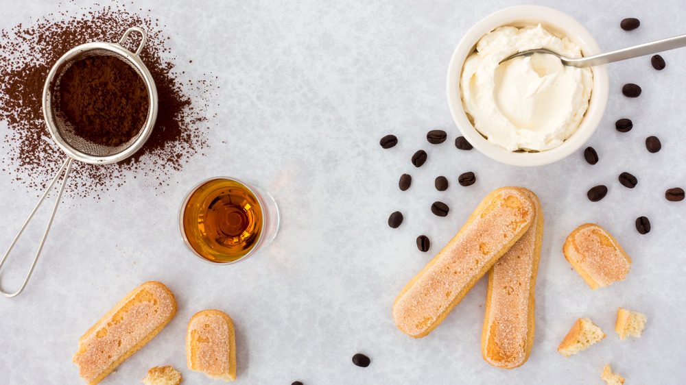 Tiramisu ingredients on a white background