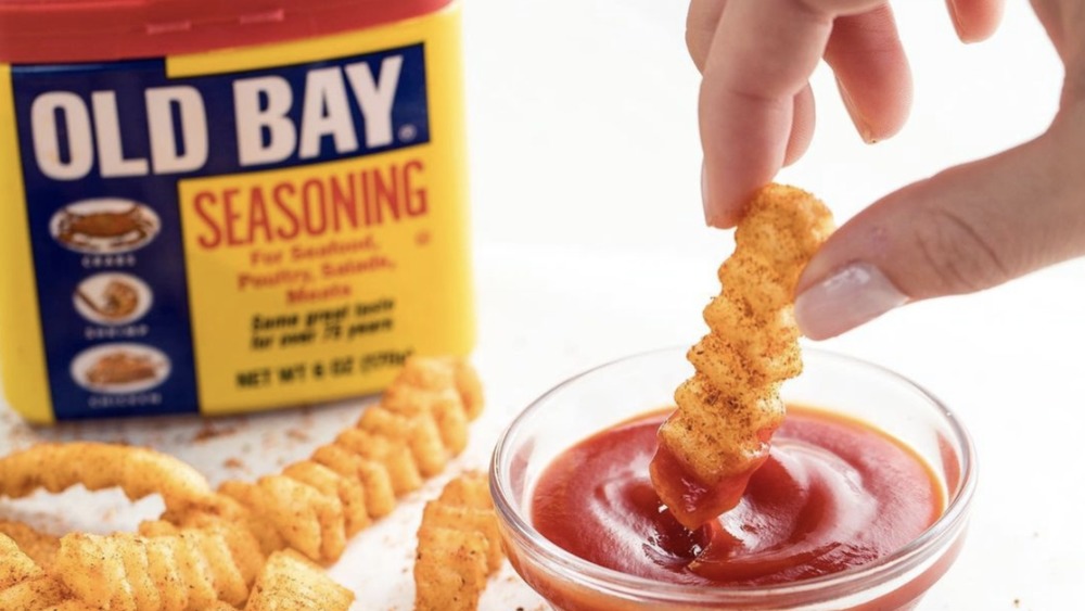 Dipping French fries in Old Bay