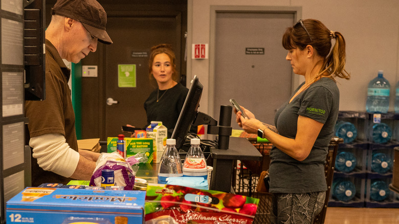 woman in checkout line 