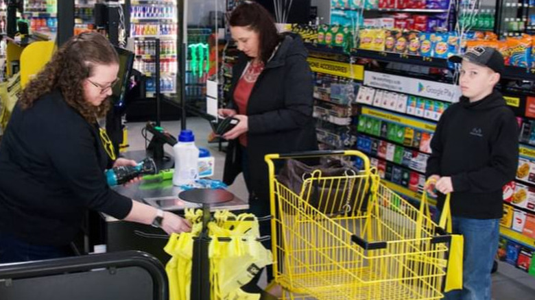 Woman returning item at Dollar General 