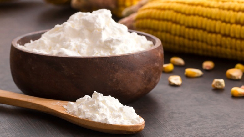 cornstarch in bowl with fresh corn