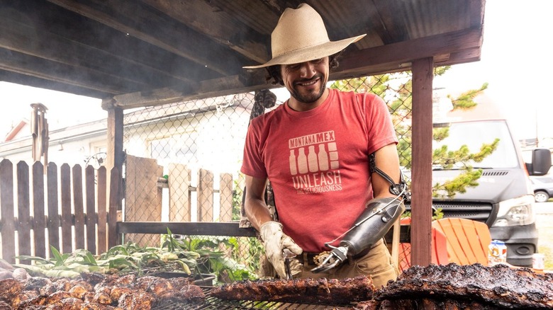 Eduardo Garcia grilling meats