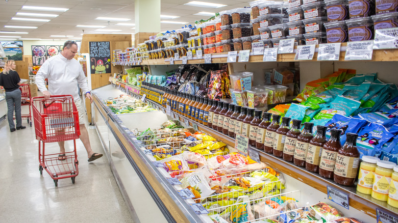 Person shopping in the Trader Joe's frozen section