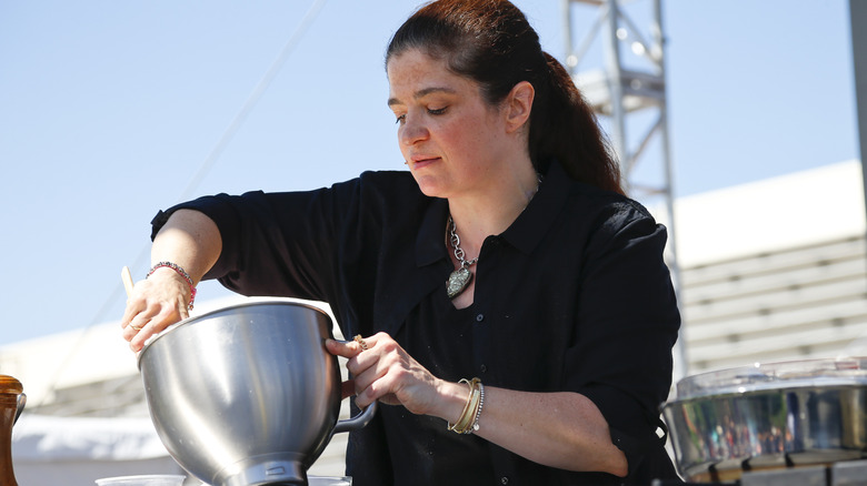 Alex Guarnaschelli cooking at an event