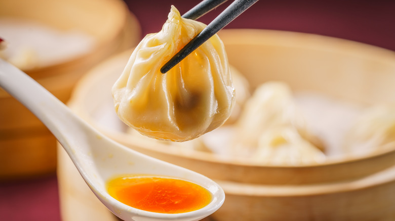 Soup dumpling help in chopsticks