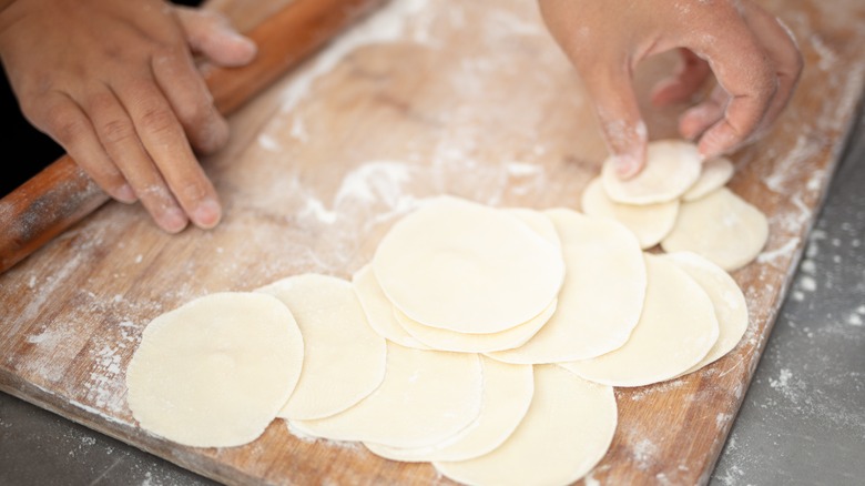 Rolling out dumpling wrappers