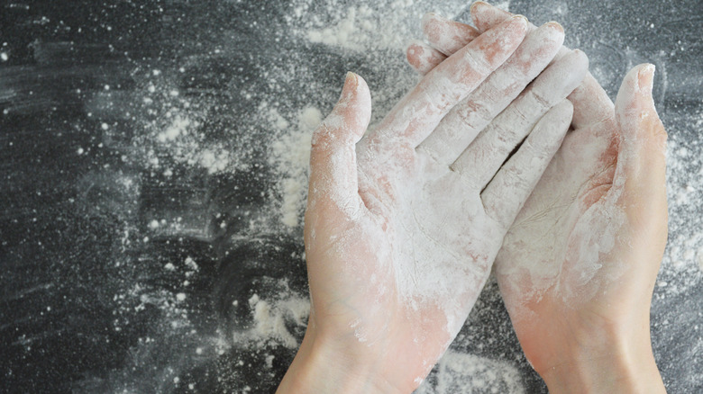 Hands covered in cornstarch