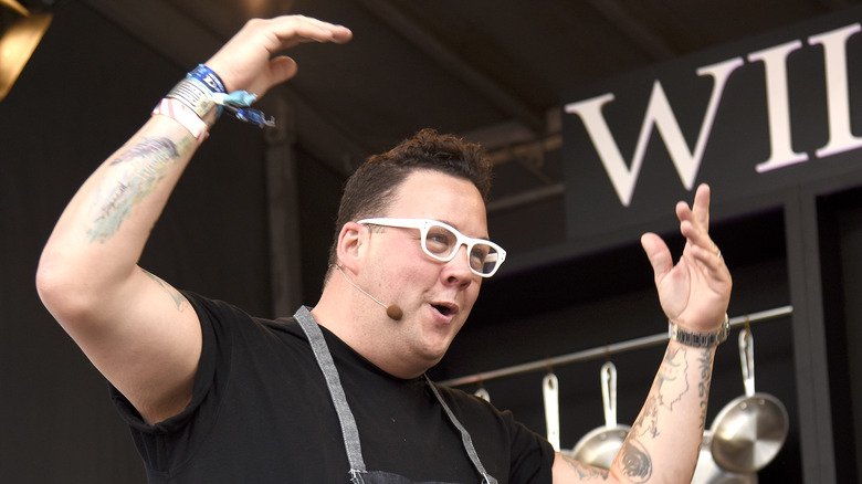 Graham Elliot with hands up