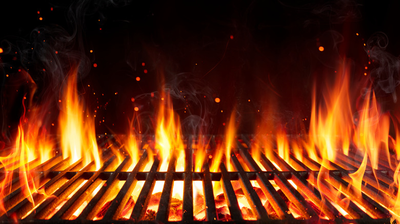 fire flames coming up through a grill