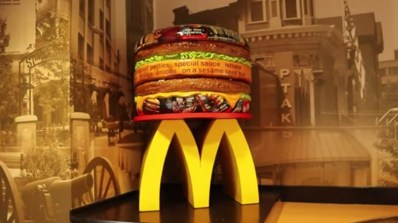 Big Mac replica on top of the golden arches