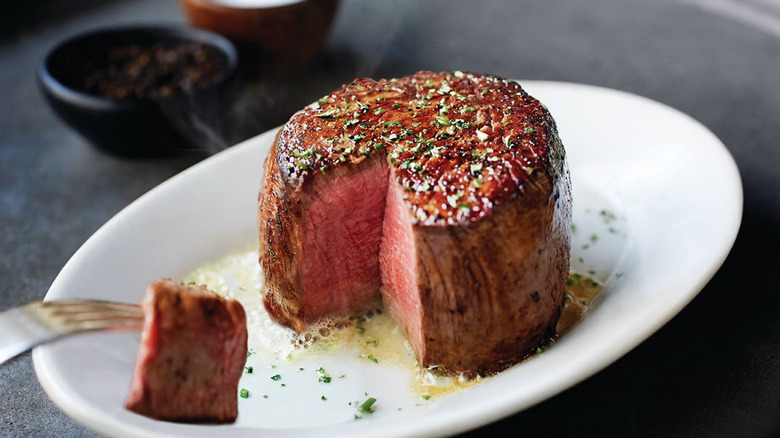 Filet mignon on white plate at Ruth's Chris