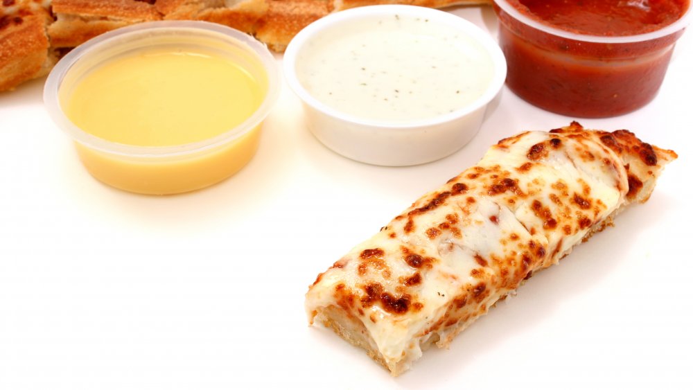 Trip of dipping sauces with cheese bread