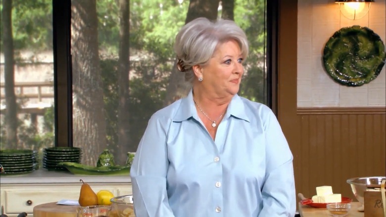 Paula Deen looks to the right