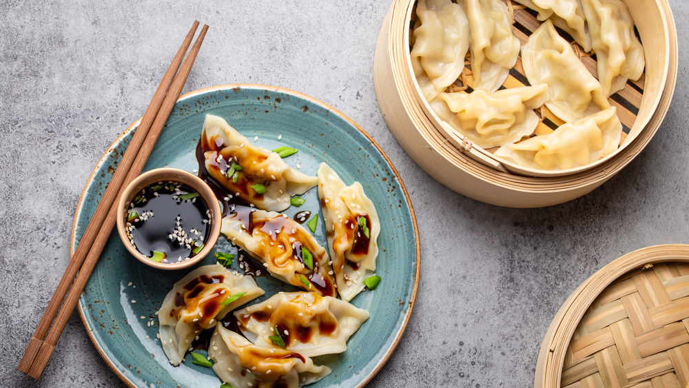 Plate of dumplings with chopsticks